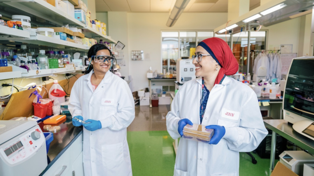 Sisters Tanjina and Tasmia Islam in UNC Greensboro's Joint School of Nanoscience and Nanoengineering's Lab